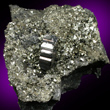 Single Bournonite Crystal on Pyrite