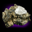 Magnesite on Matrix with Andradite