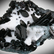 Neptunite Crystals in Natrolite