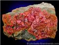Dense Realgar Crystals Covering Matrix from Cavnic Mine (Kapnikbanya), Maramures, Romania