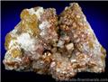 Orange-brown Vanadinite on Calcite from (San Carlos), Chihuahua, Mexico.