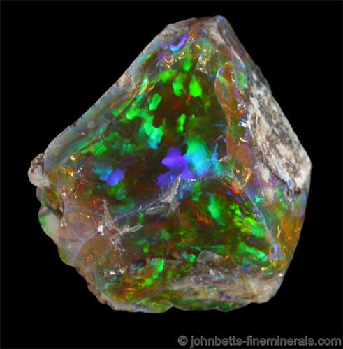 Opal: The mineral Opal (black,  white,  fire) information and pictures